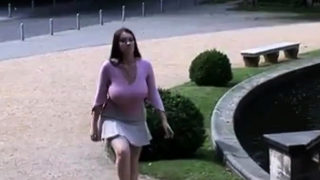 Busty girl walking, no bra, jiggling