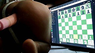 Slutty lingerie sissy in chastity playing chess online while her fucking machine pounds her boipussy