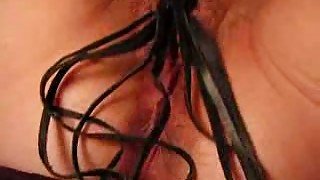 Mature slut wife pets her meaty cunt with leather whip and vibro egg