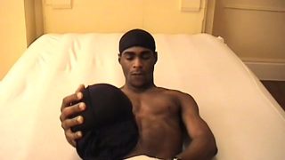 On his knees, the horny black stud gives his ebony boyfriend an awesome blowjob