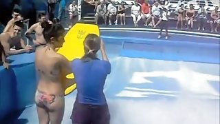 Cute flowrider got her bikini downblouse voyeured