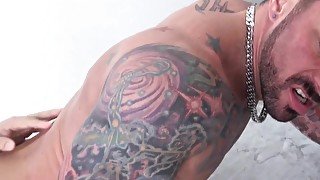 Tattooed muscle bear barebacking after rimjob