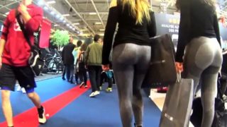 Street voyeur follows a slender teen with a magnificent ass