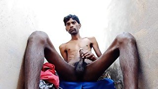 Rajesh masturbating dick outside on the stairs and Cumming in the glass