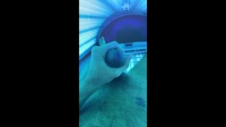 College guy jerks off in public tanning bed and taste his load of cum