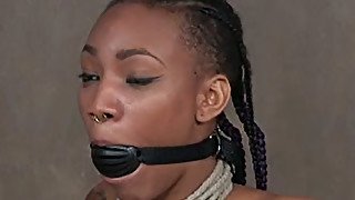 Nikki Darling looks hot here with this gag she has in her mouth