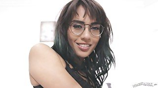 Naughty leggy nerdy brunette Janice Griffith exposes her booty before doggy