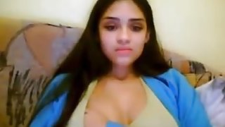 Very hot girl teasing and strpping on cam