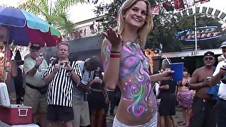 haning around key west during the day with hot body painted nude in public teens