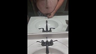 Pissing in friends sink