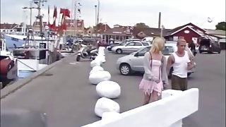 Blonde serves her boyfriends cock with a public blowjob