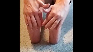 Worshiping her dirty feet with oil