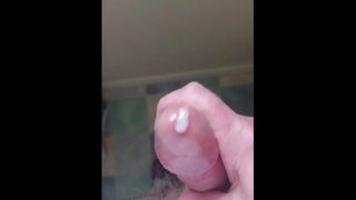 More cum spills out as I wank again and rub it all over my throbbing cock