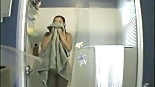 My busty wife in the shower on hidden cam video naked