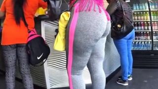 Street voyeur follows a sexy amateur babe with a big booty