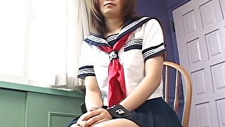 Shy and modest Japanese student shows her hairy pussy on camera