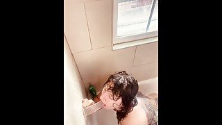 Big booty tattooed milf sucks and fucks her dildo in the shower! Close up POV!