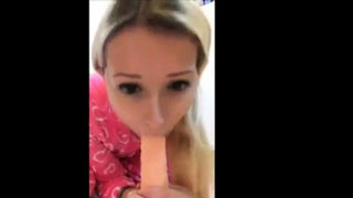 Blonde girl playing with her Dildo on bathroom floor