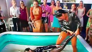 Oil wrestling girls get naked