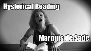 Hysterically reading Marquis de Sade while sitting on a vibrator