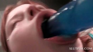 Piss lover lesbian teen gets mouth fucked with a dildo