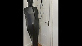 Slave in Bondage Bag Trained and Made to Stand and Wait Until Mistress Comes Back