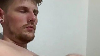 Sexy inked guy beating his big cock HARD and cums on stomach