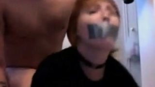 Sexy babe with ducttaped mouth fucked