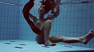 Petite pale skin European teen sweetheart under water