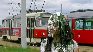 Food fight outdoors with tasty ladies