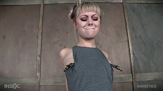 Slutty blonde Anna Tyler loves to be tied up and rough tortured