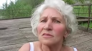 Granny pounds her hairy cunt with toys and sucks a big cock