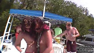 Camera follows sexy party girls on the boat