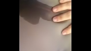 Close up wetting pissing in leggings