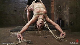 Slave in back arch bondage candle waxed