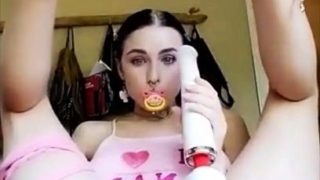 Busty brunette camgirl takes herself to climax with sex toys