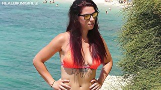 Slutty chick in bikini Charlotte P is flashing saggy small tits