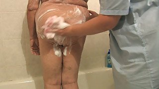 Incredibly perverted granny get her thick pussy washed properly