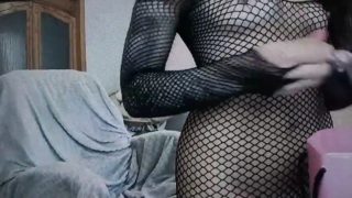 Beautiful woman in full fishnet webcam tease