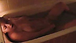 Big tits chick caught masturbating in the bath