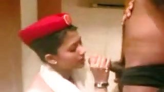 Beautiful Indian stewardess swallows the cum after giving stout blowjob in the bathroom