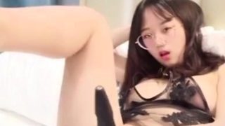 Skinny Asian girl toys creampie pussy on webcam